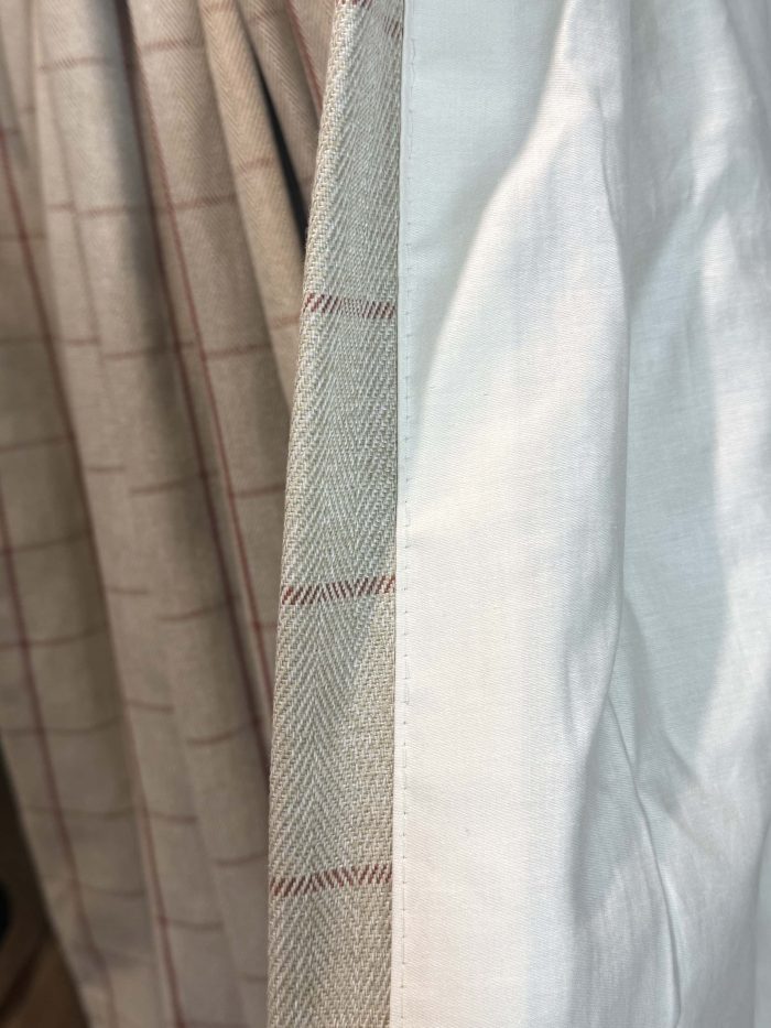 Ivory Herringbone/tweed curtains with a red check design - Image 3