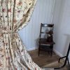 Cream, silk curtains with embroidered flowers